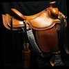 Will James tree, 16 inch seat, Gullet - 7 and 1/2 inch by 6 and 1/4 inch by 4 inch, Horn 2&1/2 inch Metal Dally, 92 degree bars, 7/8ths flat palte riggin, Cheyenne Roll, Full Vaquero Lace Border Saddle built by Keith Valley.